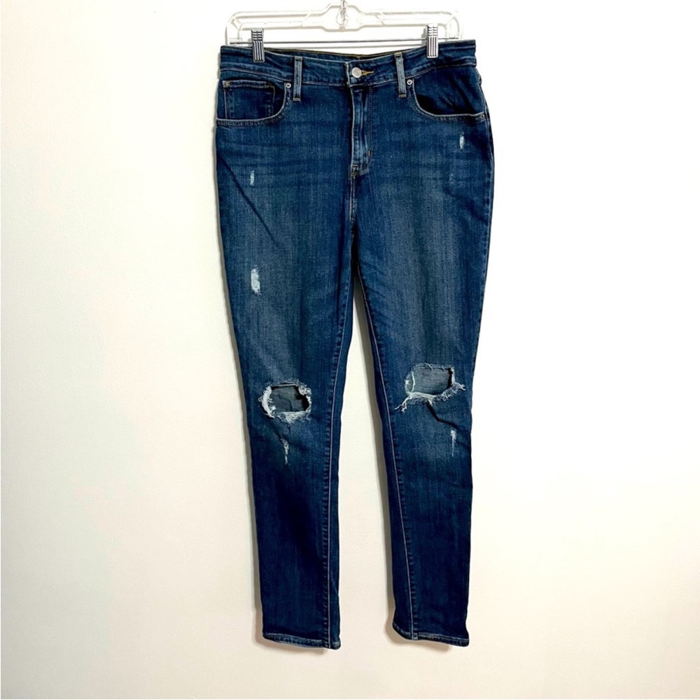 Levi’s 721 High Waisted Distressed Skinny Jeans